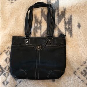 Coach black leather shoulder bag.